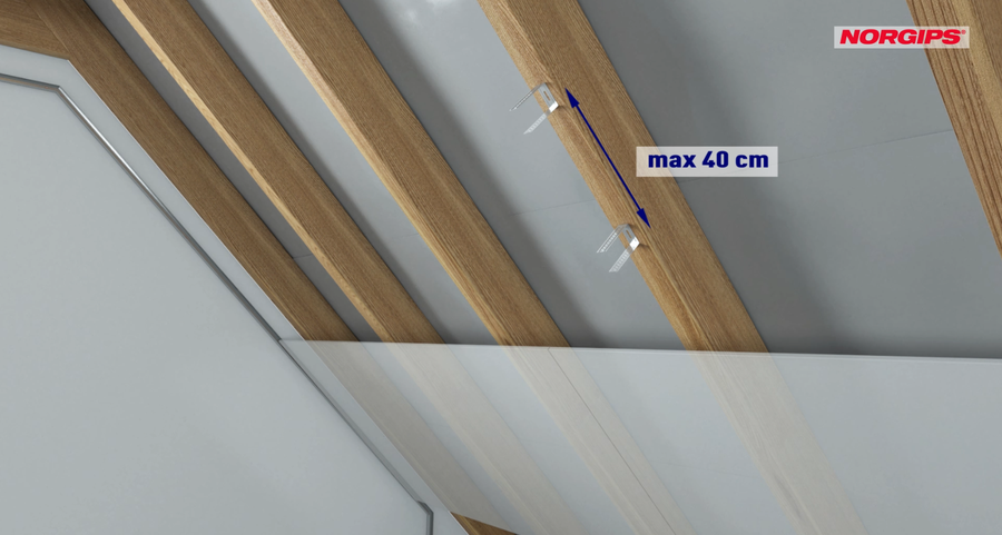 Determinarea locației pentru instalarea cârligelor plate de tip ES sau de tip L - instalarea plăcilor de gips-carton perpendicular pe căpriori.